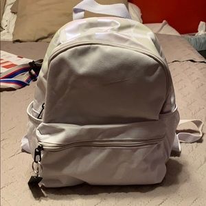 nike grey and iridescent just do it mini backpack